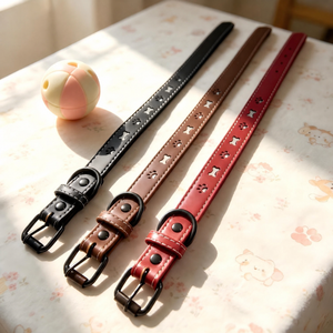 Black, brown and red adjustable PU leather dog collars laid flat