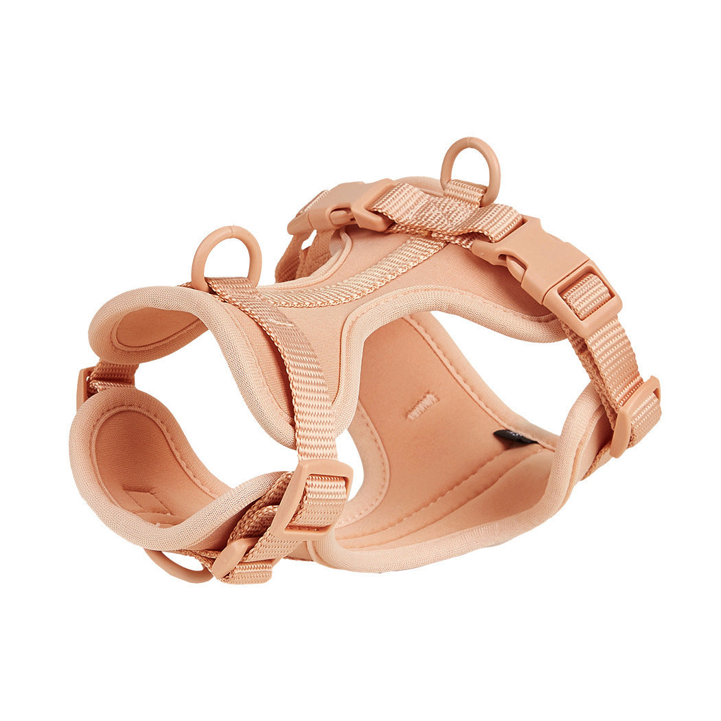 Soft padded dog harness in peach with quick-release buckles