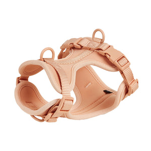 Soft padded dog harness in peach with quick-release buckles