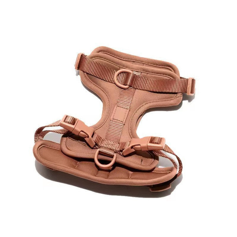 Soft padded dog harness in brown, top view showing padded chest panel and D-rings