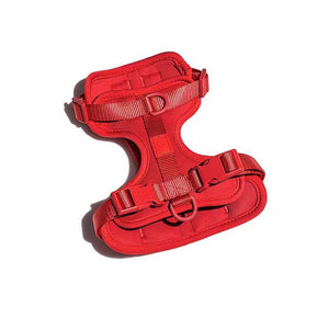 Soft padded dog harness in red, flat top view showing adjustable chest straps