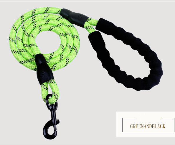 Green reflective rope dog leash with a black padded handle and metal clasp