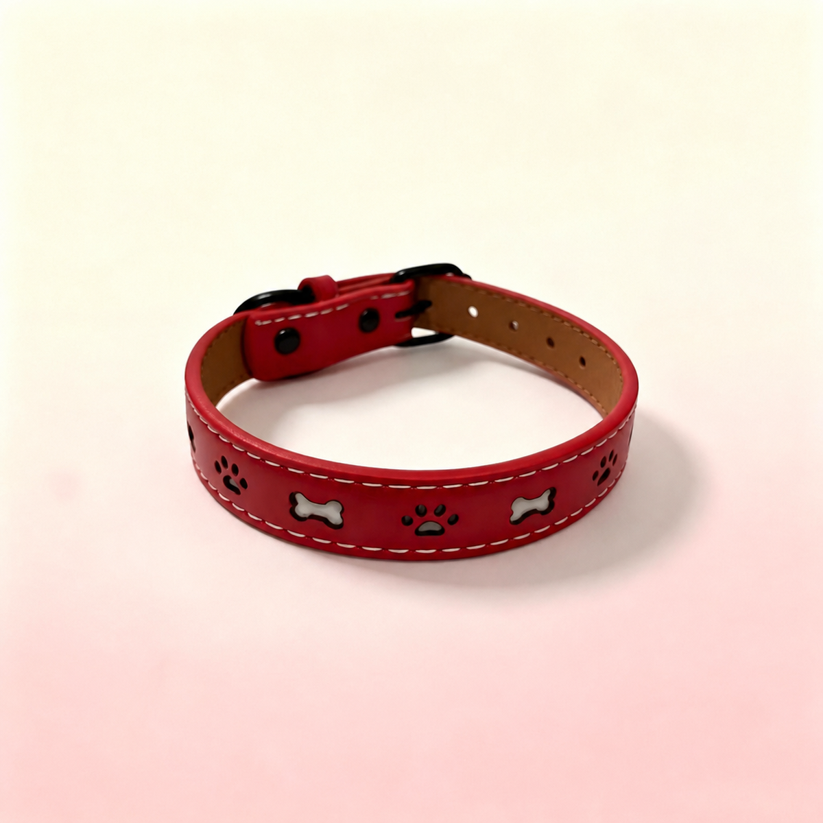 Red reflective PU leather dog collar with paw and bone details