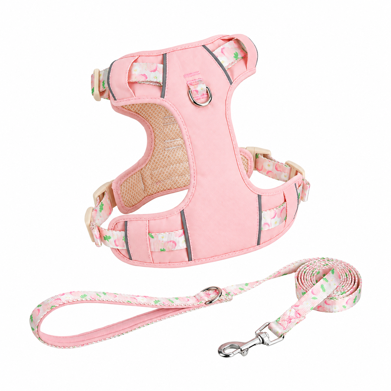 Reflective dog harness and leash set in pink, flat lay view